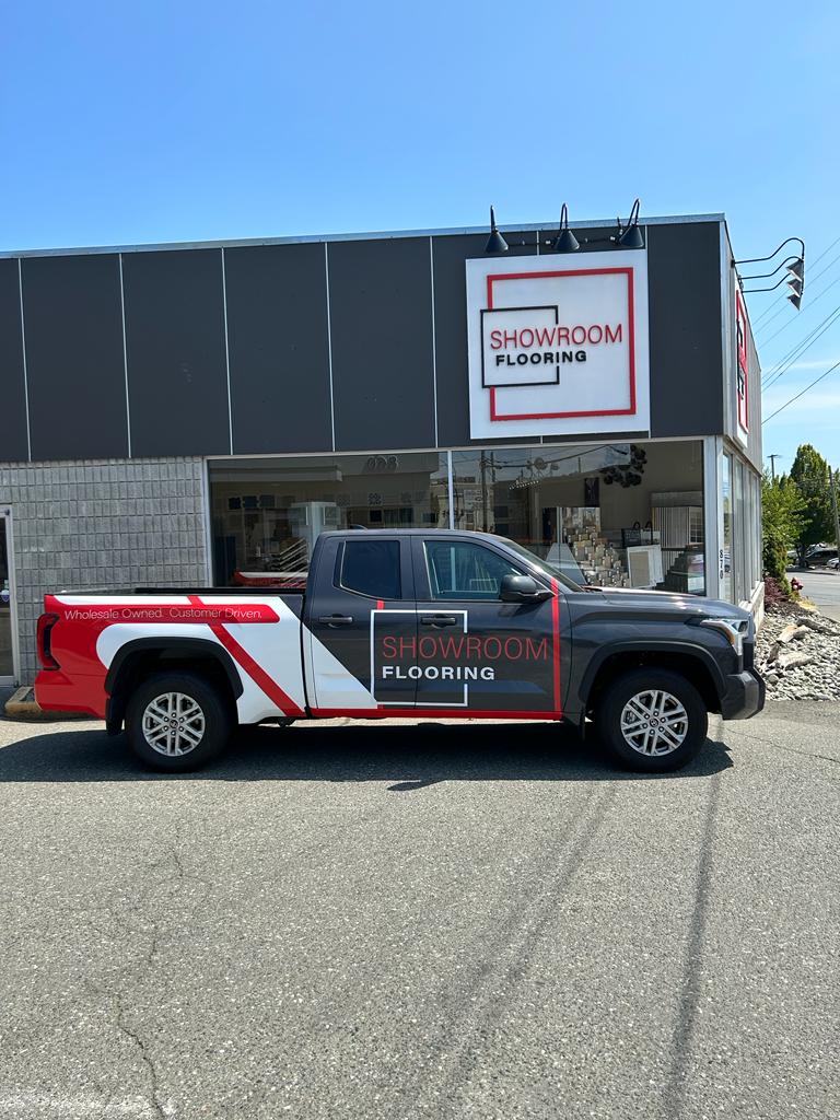 Actual Showroom Flooring storefront, signage and entrance at 870 Cliffe Avenue in Courtenay